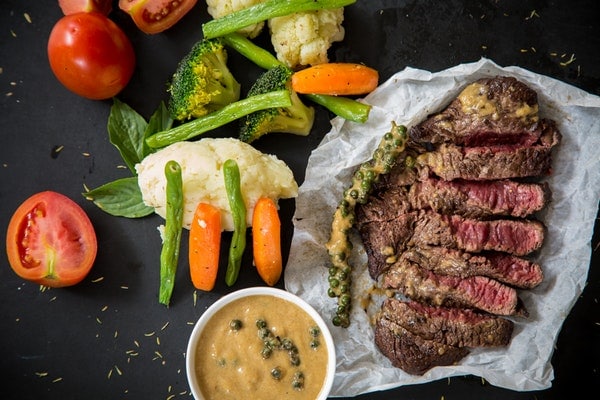 Steak food with fresh tomatoes and vegetables